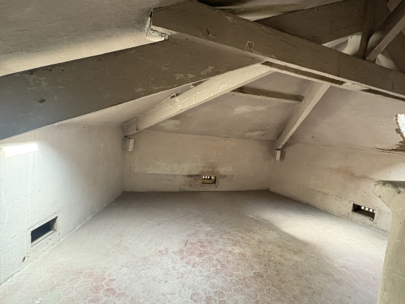 Attic apartment in need of renovation with great potential in the heart of La Condamine